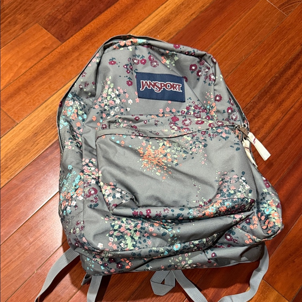 Jansport Gray Backpack with Pink, Teal and Orange Floral Accents